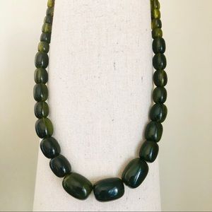 Gorgeous vintage large graduated green resin necklace
